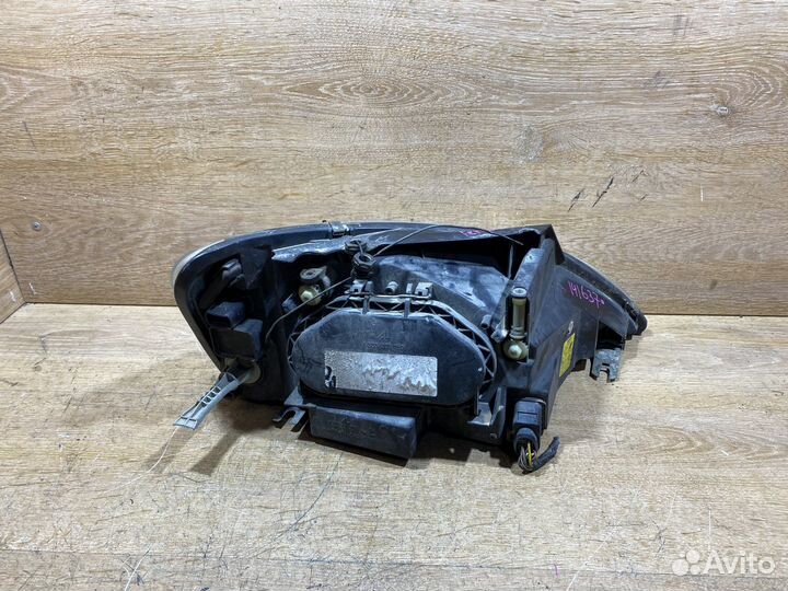 Фара передняя левая Ford Galaxy рестайлинг 141637