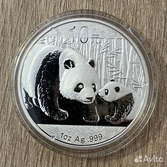 Серебряные монеты Панда Китай