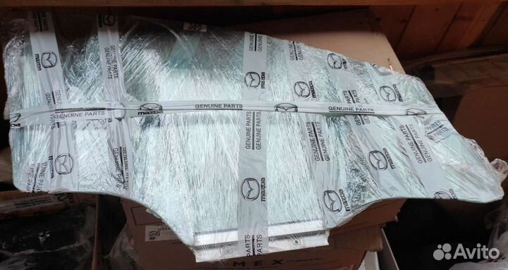 Стекло двери левой передней Opel Corsa D