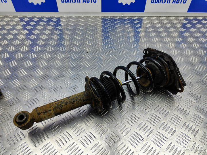 Амортизатор задний правый Nissan Almera N16 1.5