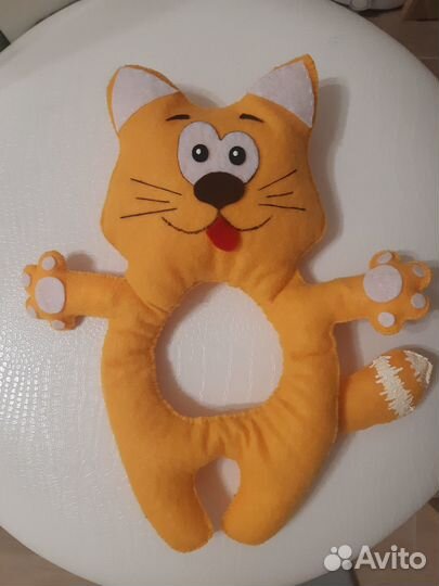 Игрушка на объектив