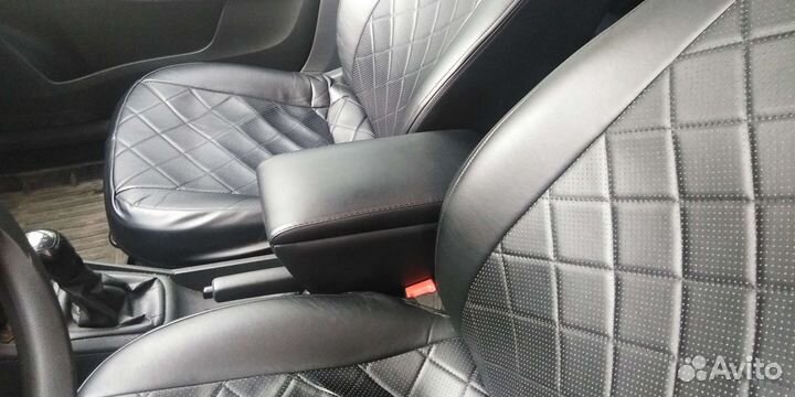 Подлокотник на skoda rapid