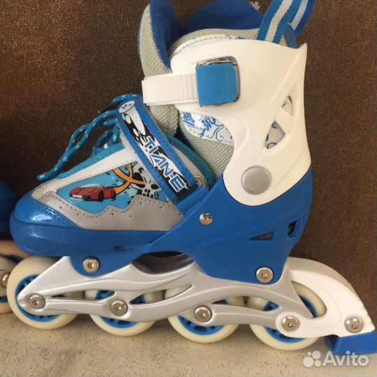Коньки роликовые