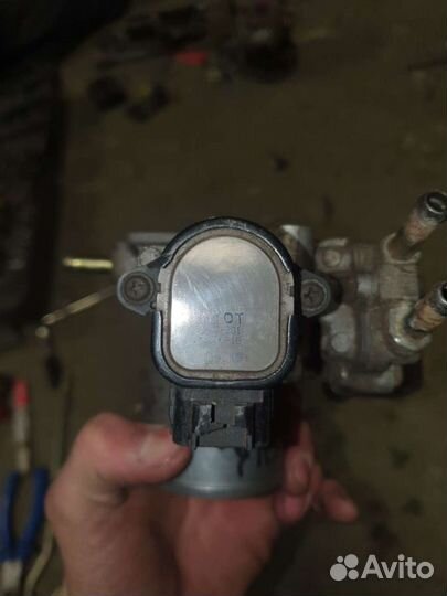 Дросельная заслонка Тоуота vitz