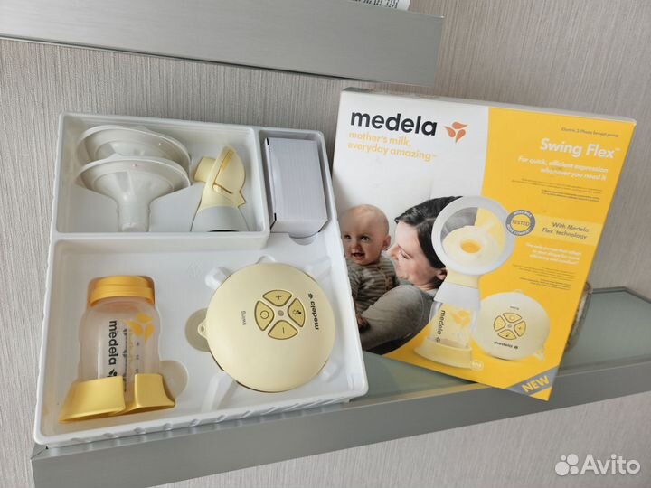 Молокоотсос электрический Medela + много еще