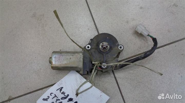 Моторчик стеклоподъемника задний левый Mazda 626