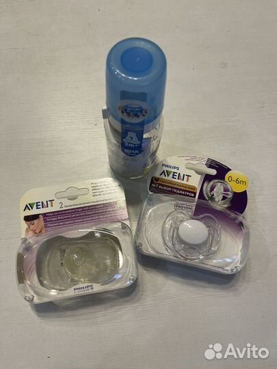 Бутылочка, пустышка и накладки для кормления
