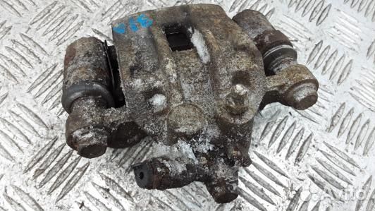 Суппорт тормозной задний левый KIA CEE'D 1 (SML24L