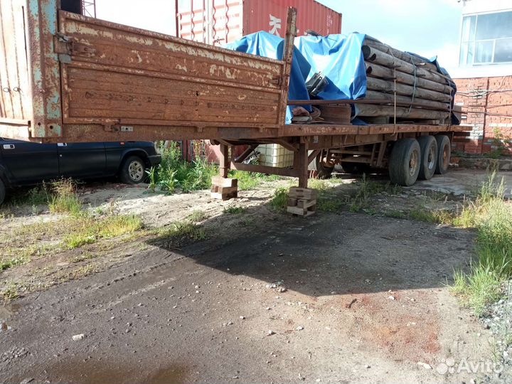 Полуприцеп лесовоз (сортиментовоз) МТМ 933011, 2004