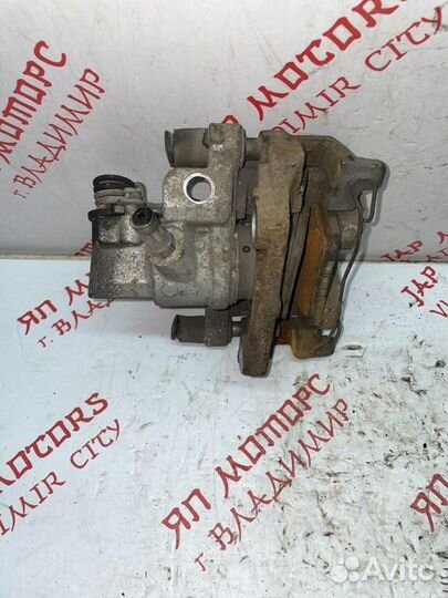 Суппорт тормозной задний правый Volvo V40 хетчбек