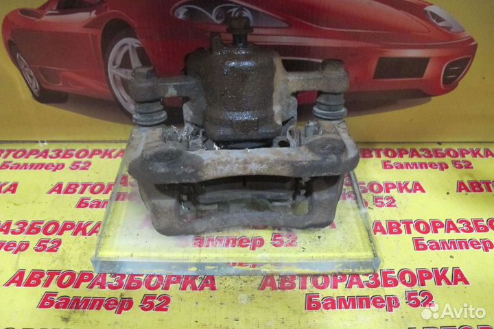 Суппорт тормозной задний правый Hyundai Tucson