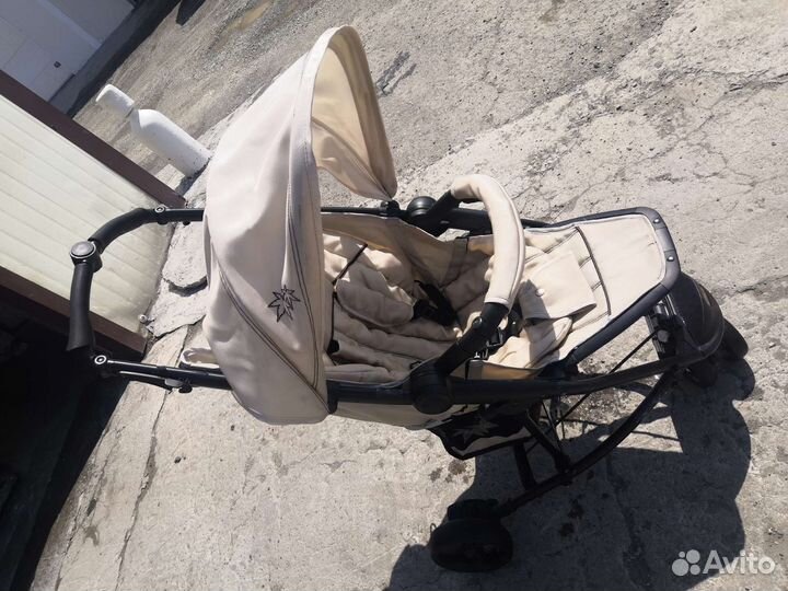 Прогулочная коляскарцншр
