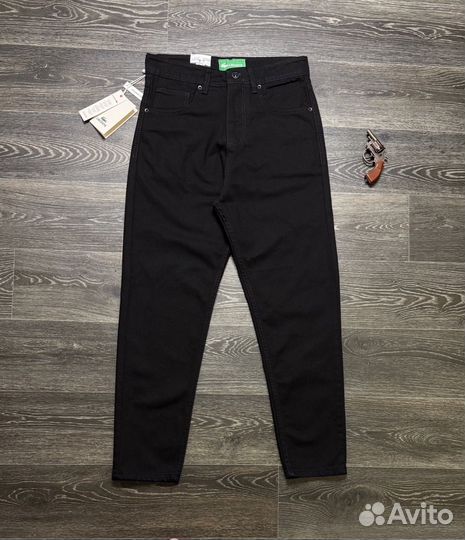 Джинсы Lacoste