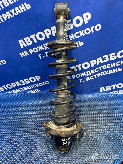 Задняя стойка амортизатора Mitsubishi Lancer 9