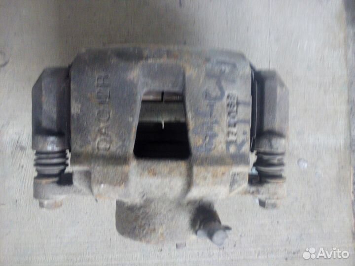 Суппорт передний Chevrolet Lacetti