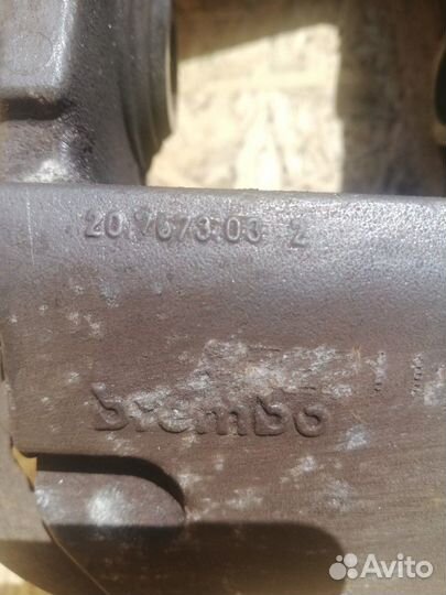 Суппорт задний левый Volkswagen Touareg