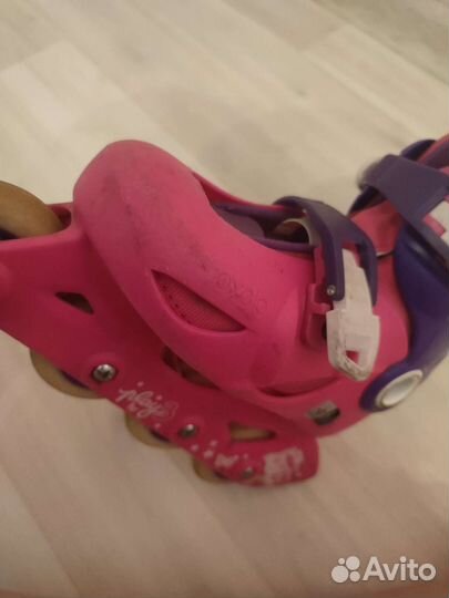 Роликовые коньки