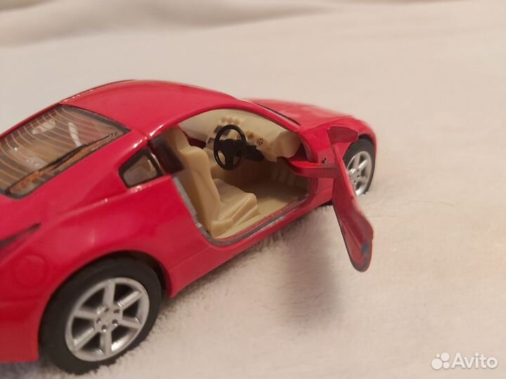 Модель автомобиля Kinsmart Nissan 350Z 1/34