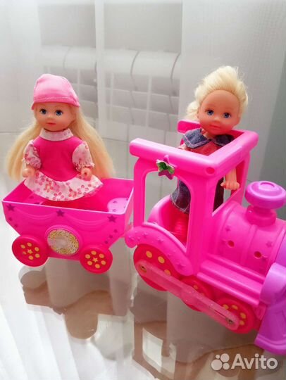 Паровозик с куклами