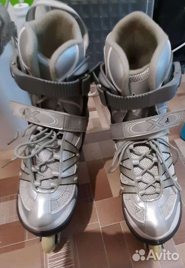 Роликовые коньки