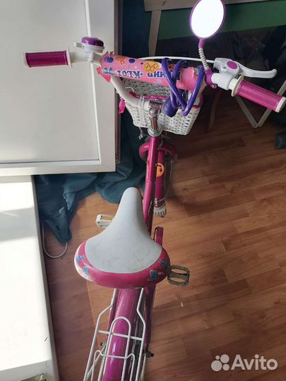 Продам детский велосипед с боковыми колесами
