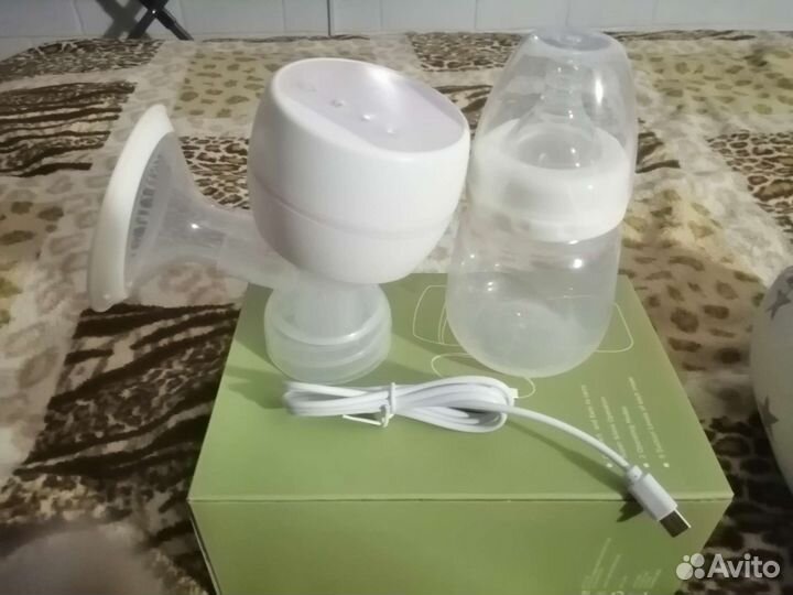 Молокоотсос электрический новый