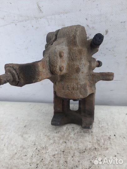 Суппорт тормозной задний левый Honda Civic хэтчбэк