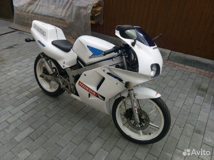 Honda ns1 отзывы. Honda NS 1 1991. Мотоцикл Хонда нс1. Honda ns1 ev. Honda ns1 2022.