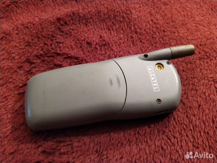 Кнопочный телефон Alcatel в коллекцию