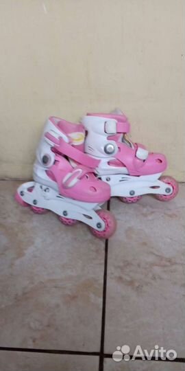 Роликовые коньки