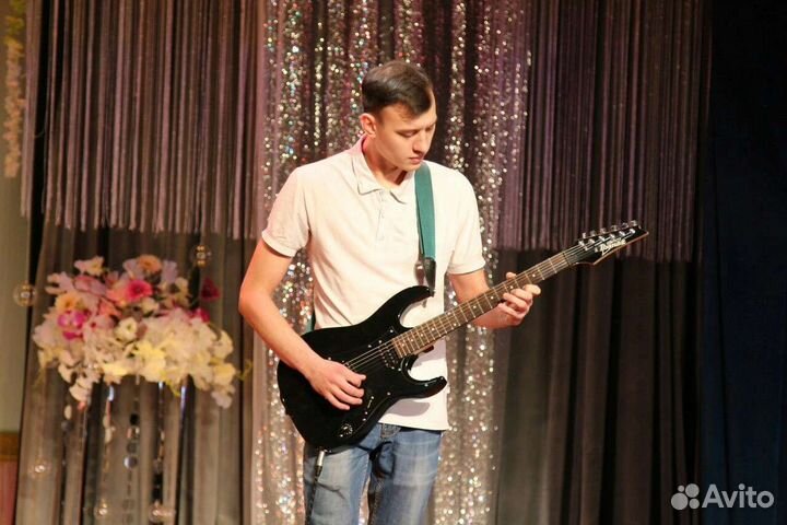 Преподаватель по гитаре