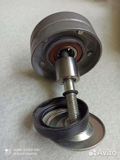 Ролик натяжителя