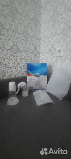 Новый ручной молокоотсос