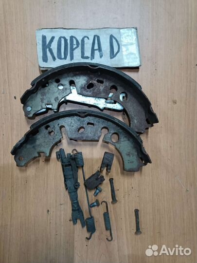 Механизм ручника с колодками Опель Корса Д