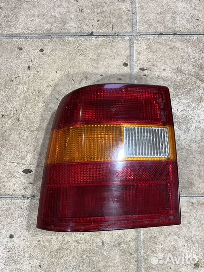 Фонарь номерного знака Opel Vectra A