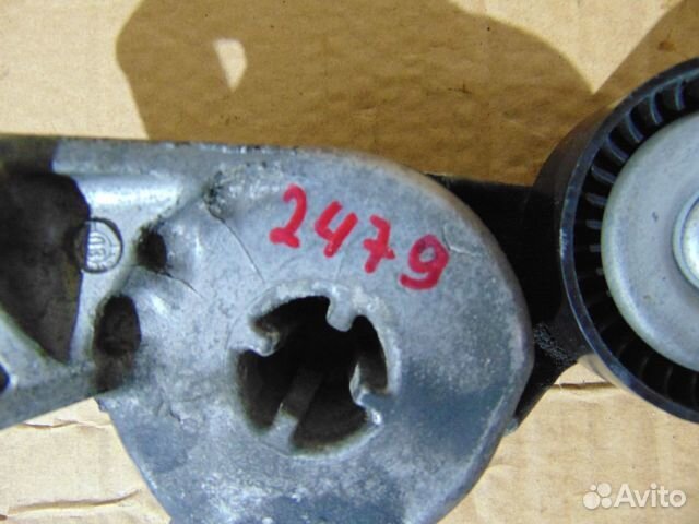 Ролик-натяжитель ручейкового ремня Volkswagen