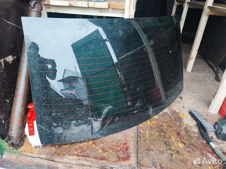 Заднее стекло Рено Логан 2