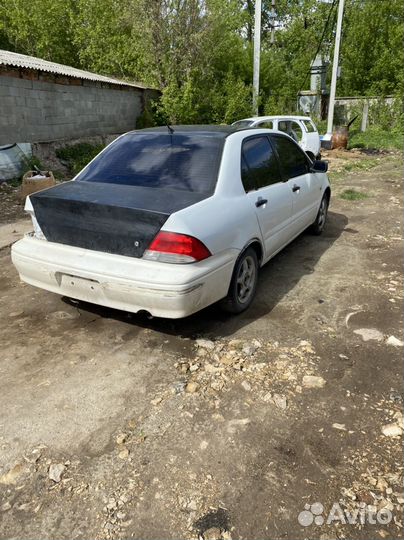 Разбор mitsubishi lancer cedia/lancer9