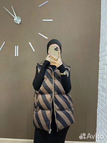 Теплая желетка