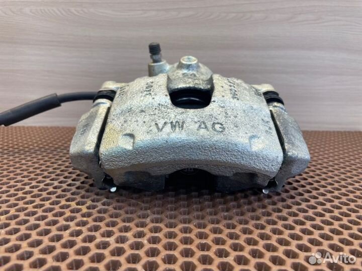 Суппорт тормозной передний правый Skoda Rapid