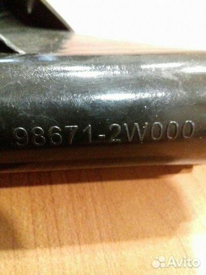 Форсунка омывателя фар левая Hyundai Santa Fe 2012