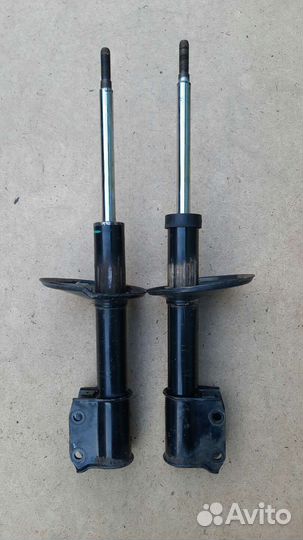 Передние амортизаторы Ларгус Логан Сандеро Ниссан