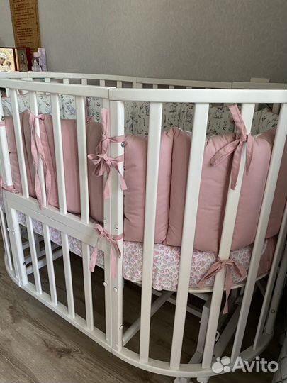 Детская кроватка с маятником круглая