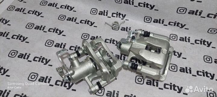 Суппорт тормозной задний солярис Sat