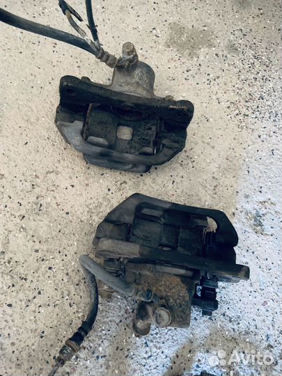 Суппорт тормозной задний Toyota Land Cruiser 100