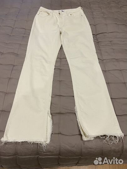 Джинсы zara с разрезами 34