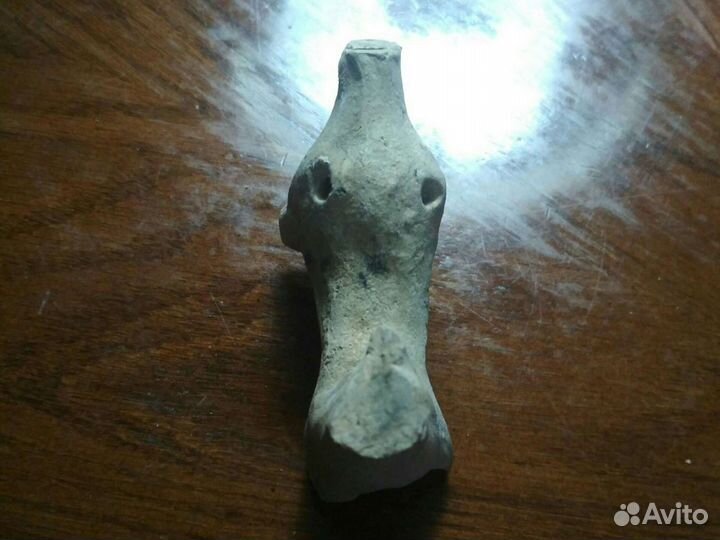 Древняя свистулька из глины