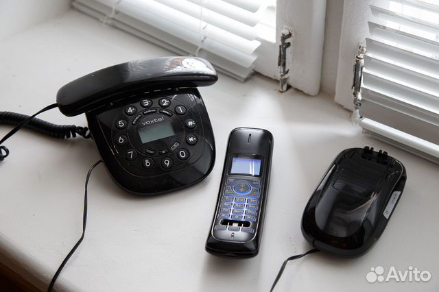 Радиотелефон Voxtel с автономной зарядной станцией объявление продам