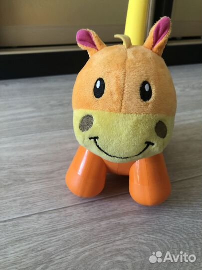 Игрушка каталка Музыкальная