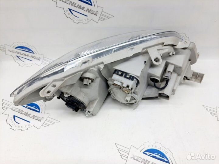 Фара передняя левая Toyota Corolla Fielder